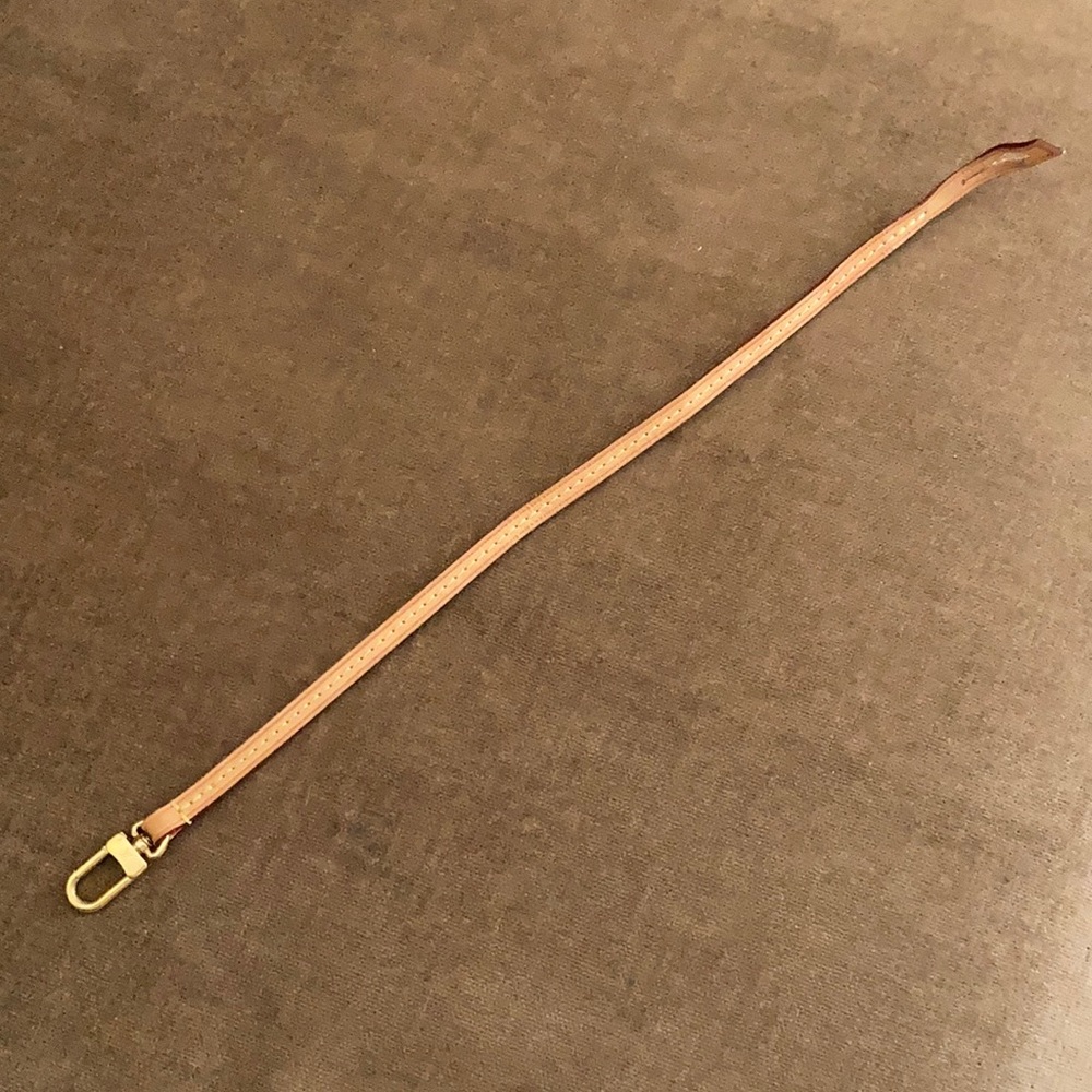 Louis Vuitton Pochette Strap.  Vachetta leather.